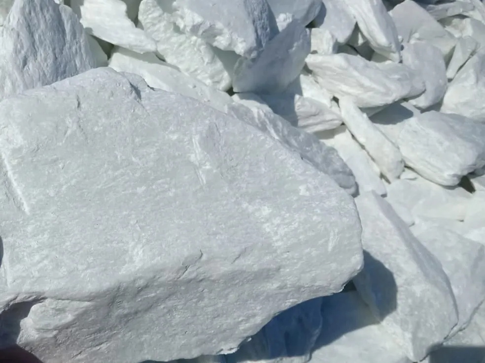 Close-up of white talc lumps.
